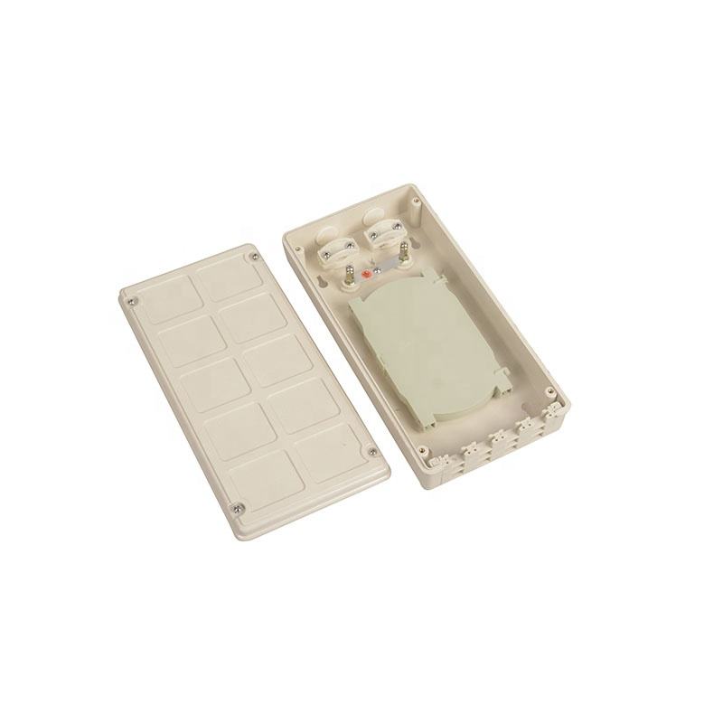 Caja de terminales de plástico Montaje en pared de 12 núcleos o montaje en bastidor disponible Panel de parcheo óptico de placa frontal de fibra FTTH para interiores y exteriores